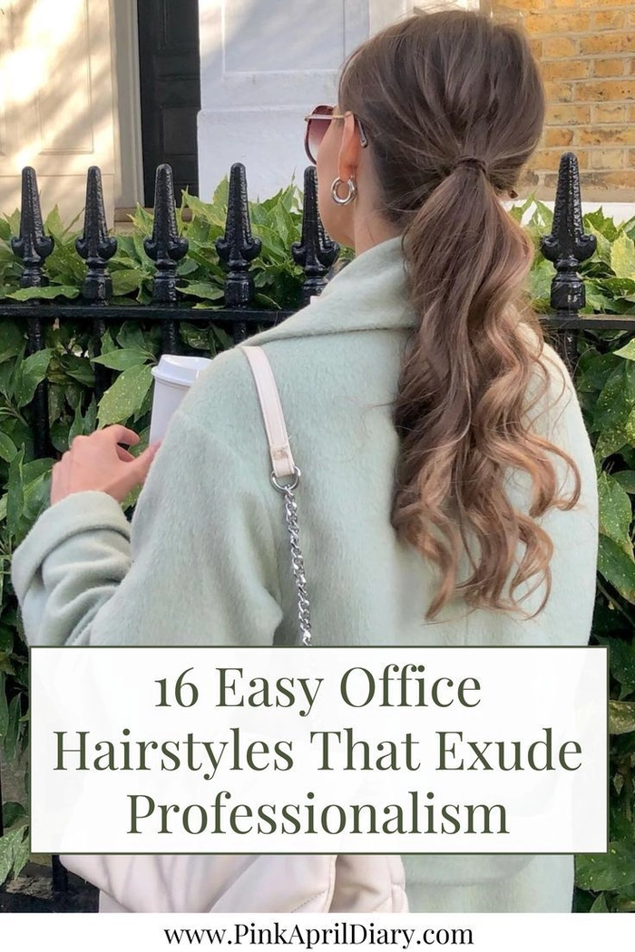 Hair tuck hairstyle that complements glasses for a professional work look Woman with glasses wearing a tidy hair tuck hairstyle at her office desk