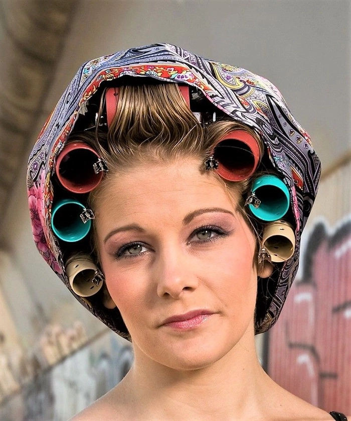 Classic roller set hairstyle for a mature businesswoman in office setting