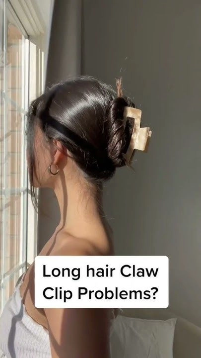 Claw clip sizing guide for thick work hair showing various clip sizes on a table