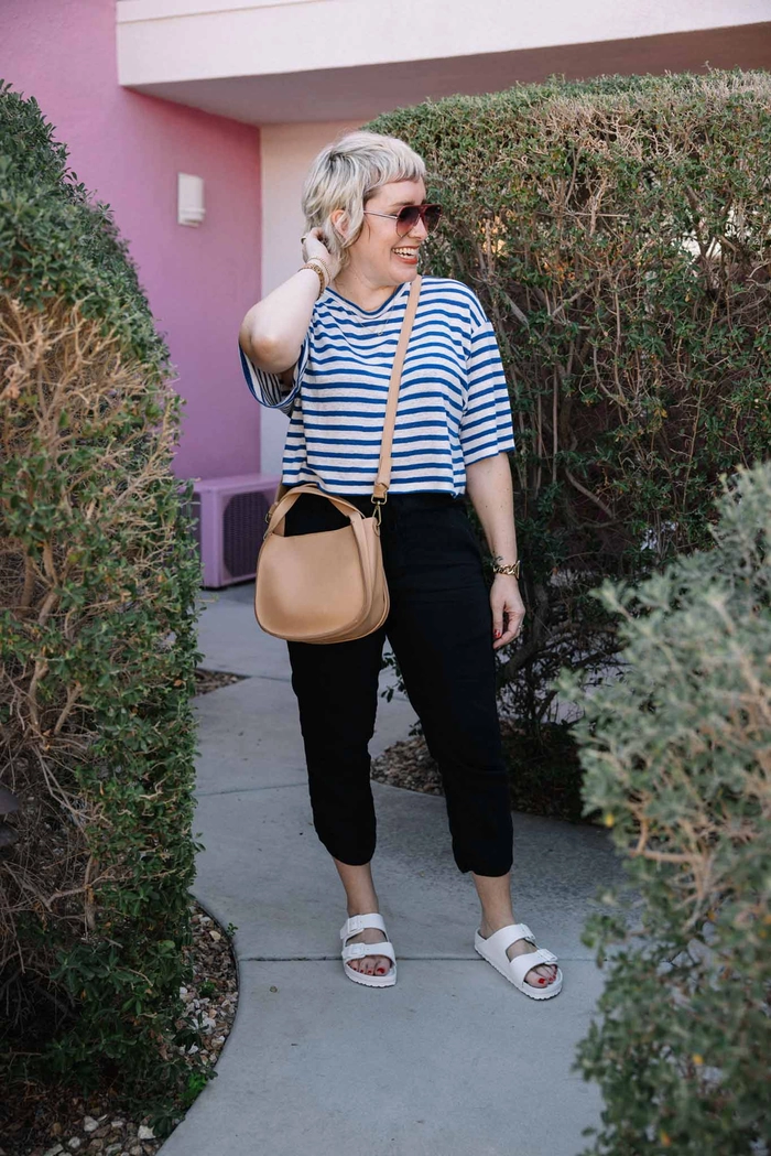 Sleek rain-proof bun hairstyle perfect for spring commuting to work