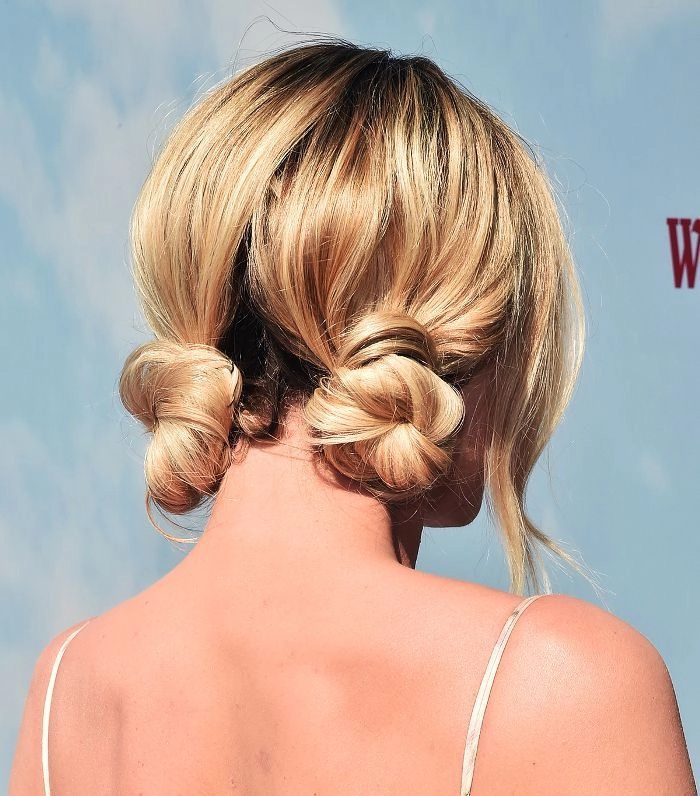 Step-by-step tutorial for creating a secure work bun with long waist-length hair Secure work bun for waist-length hair, styled neatly for professional workplace
