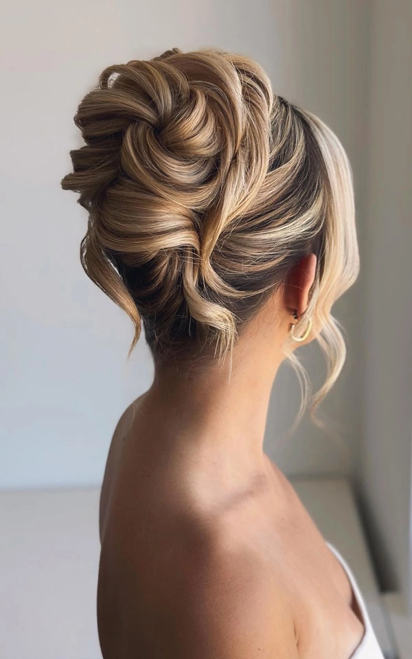Elegant voluminous updo for thinning hair at work, styling fine hair with soft texture and height