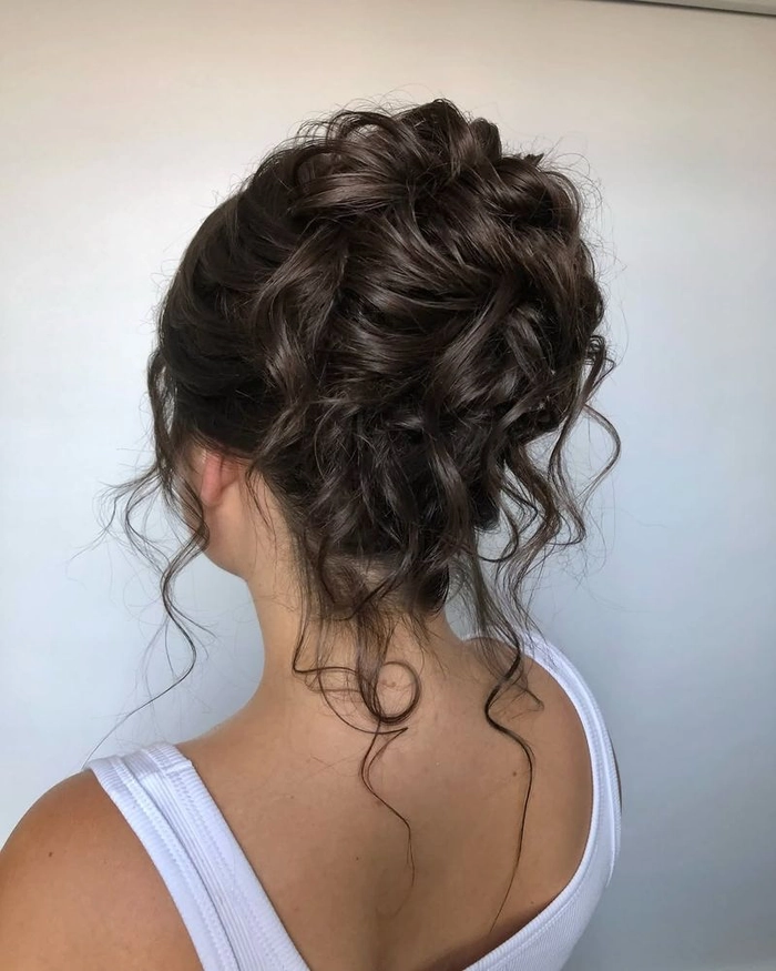 Elegant updo hairstyle for women with menopausal hair thinning, perfect for professional work environments