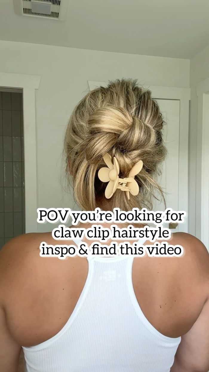 Woman with a sleek messy claw clip updo styled for corporate casual Friday