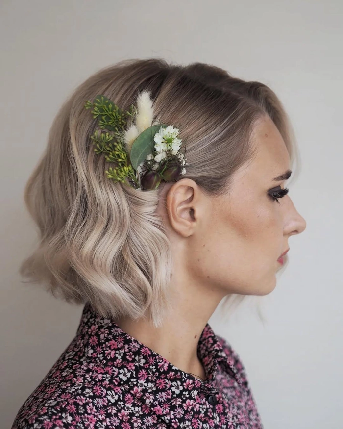 Professional short hair with minimalist barrette accessory for office setting