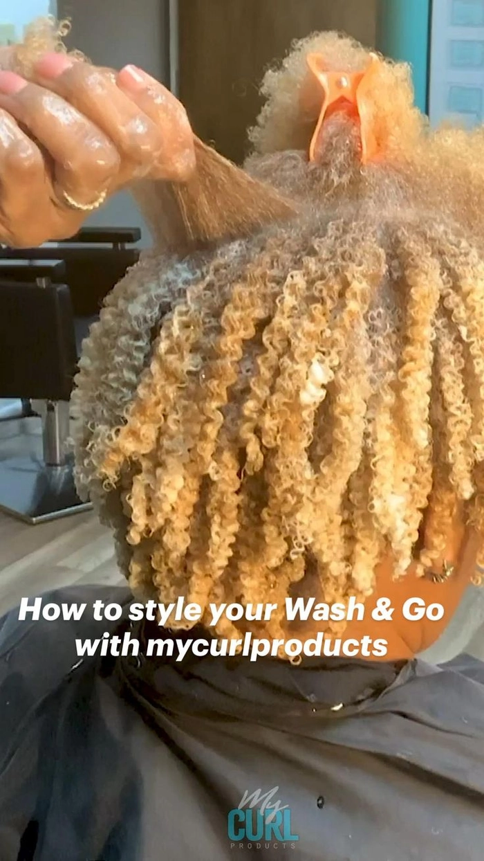 Natural curly wash and go hairstyle suitable for professional work environment