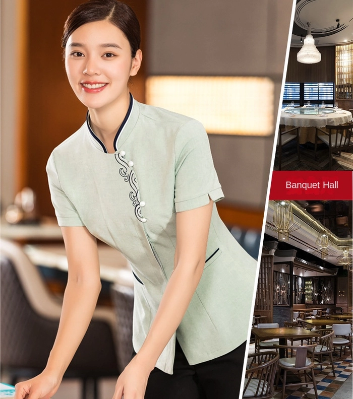 Humidity-resistant work hairstyle for front of house staff Restaurant waitress with a humidity-proof updo hairstyle, smiling while serving a table