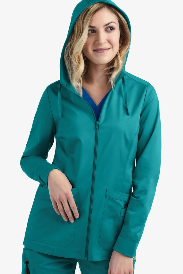 A sleek sweat proof updo for long nursing shifts, secured with pins and a light hold product