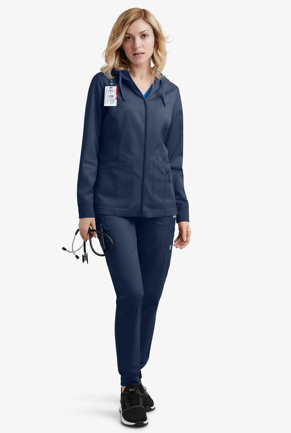 Nurse with a sleek, sweat-proof updo hairstyle after a long shift