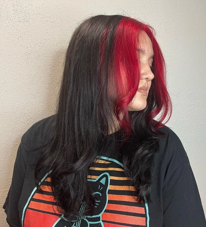 Woman showcasing face framing layers with an office hairstyle for a round face shape
