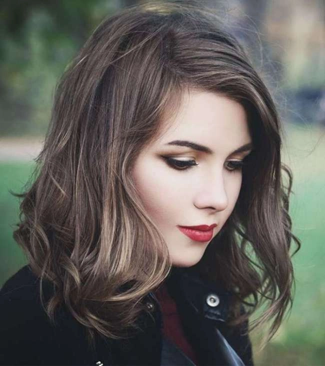 Professional layered bob hairstyle suitable for office settings with clean, structured layers