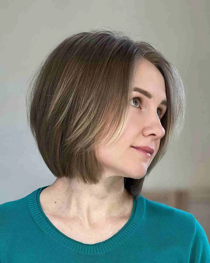 Professional layered bob hairstyle with soft waves for office