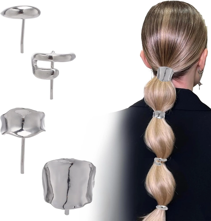 Metal hair cuff positioned on a polished corporate ponytail for a refined work look Professional metal hair cuff accenting a sleek low ponytail in a business setting