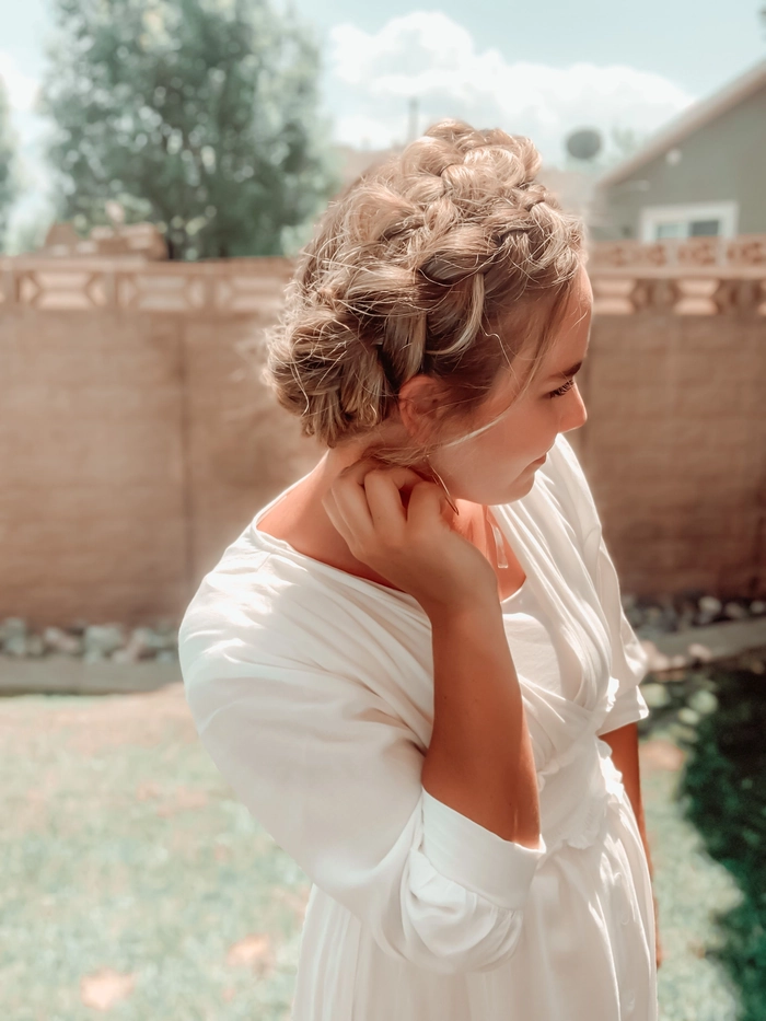 Neat braided crown hairstyle for a conservative office setting