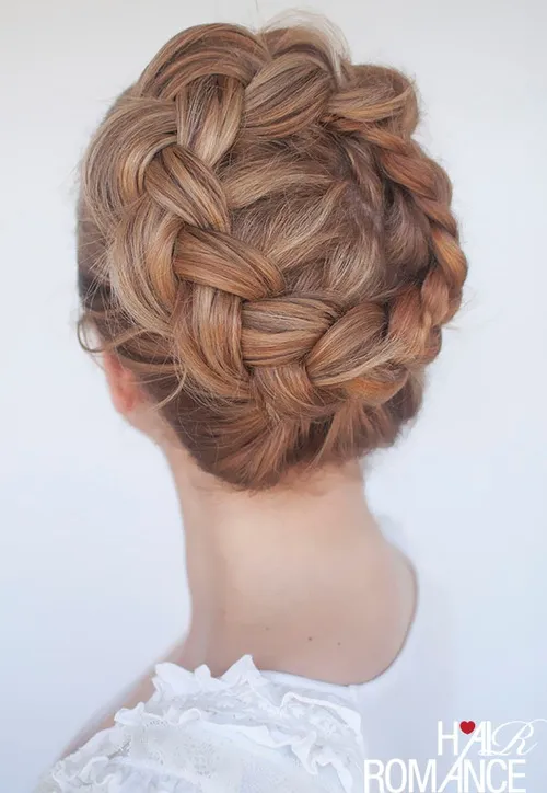 Neat braided crown hairstyle suitable for a conservative office environment, featuring tightly woven braids and a polished finish