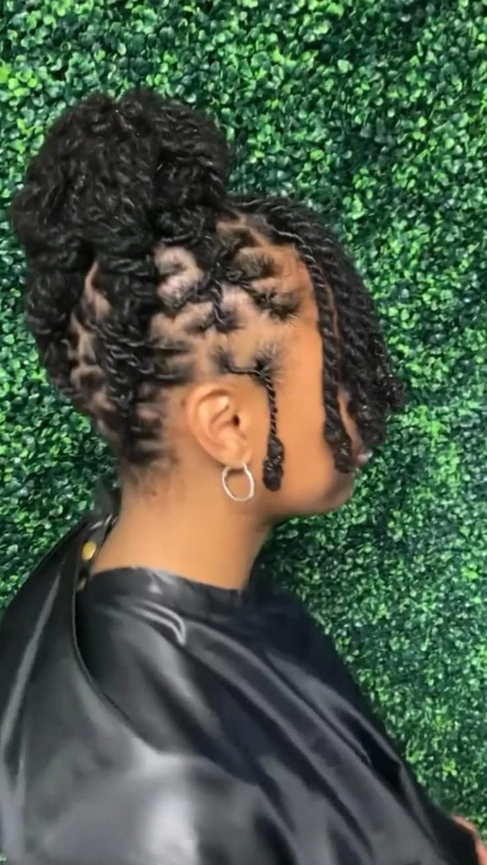 Professional locs in an updo for work Elegant loc updo styled for a business meeting