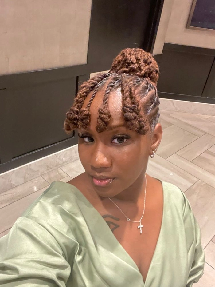 Professional loc updo business meeting hairstyle Neat loc updo with twisted bun for professional business meeting
