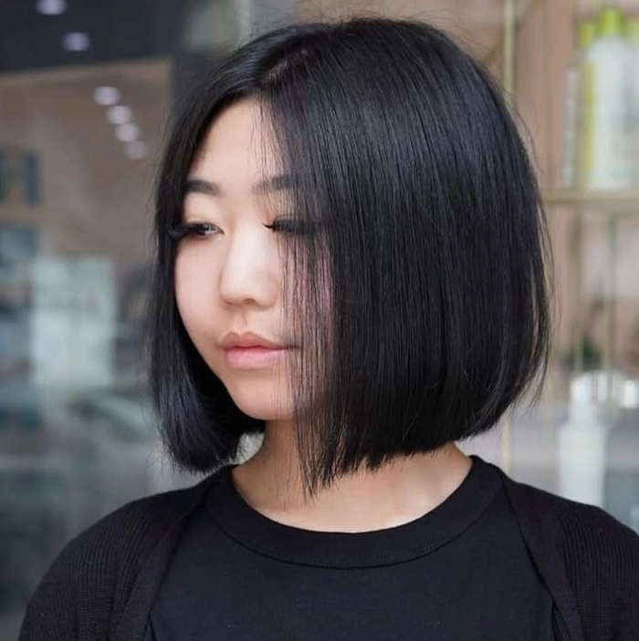 Professional neck elongating updo hairstyle for shorter necks in a work setting