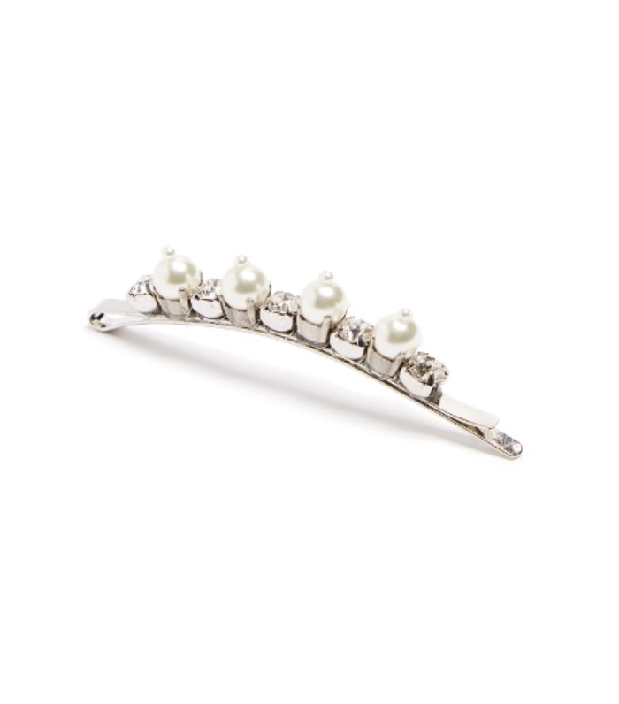 Professional hairstyle with pearl hair clip arrangement for corporate presentation