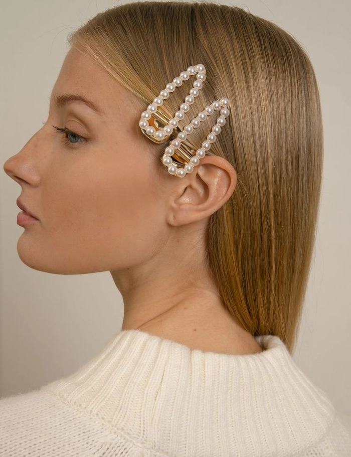 Pearl hair clip arrangements styled for a corporate presentation