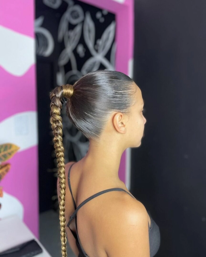 A polished ponytail hairstyle perfect for client meetings, with sleek and professional styling
