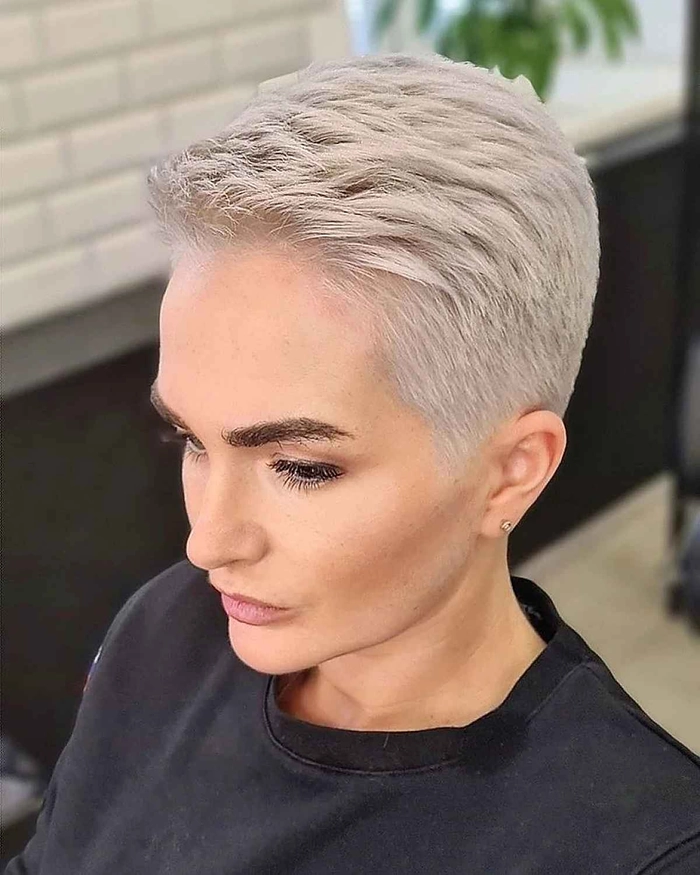 Professional short pixie cut hairstyle suitable for office environments Professional short pixie cut styled for a polished workplace look