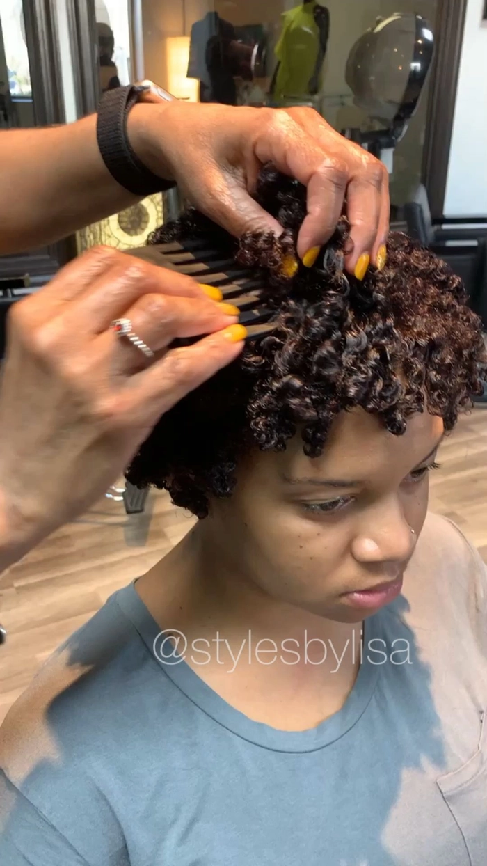 Professional twist out hairstyle in a corporate office setting
