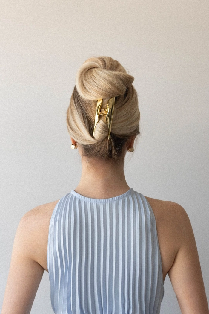 Step-by-step quick claw clip updo for corporate casual Friday hairstyles