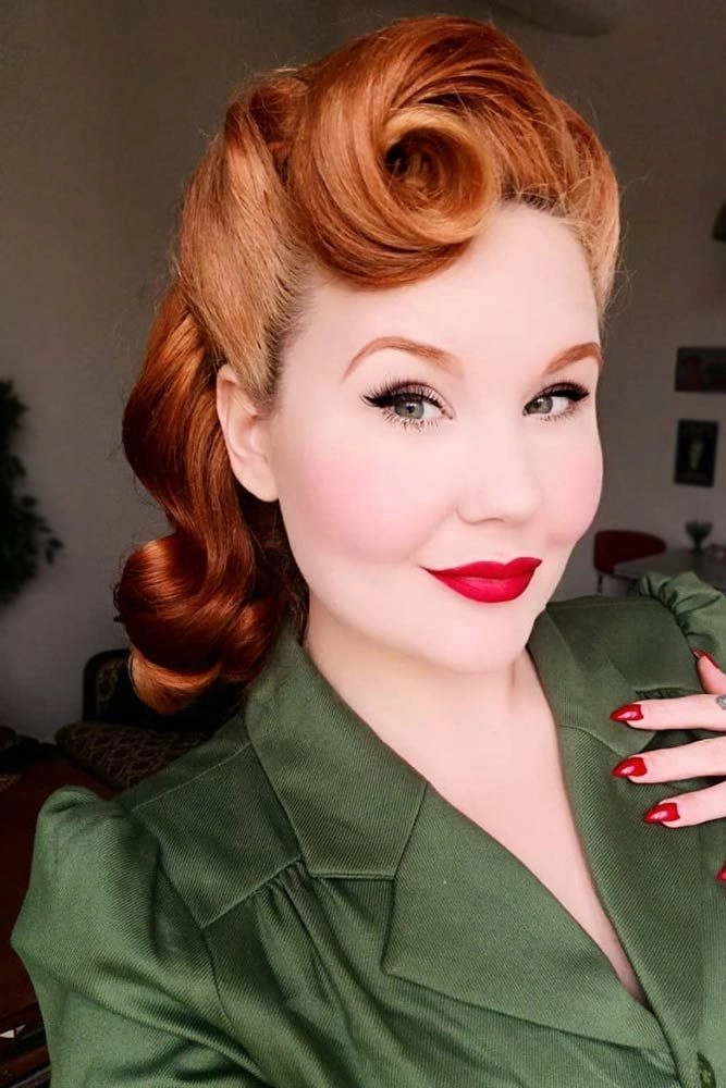 Woman with rolled vintage victory rolls hairstyle suitable for retro themed work events