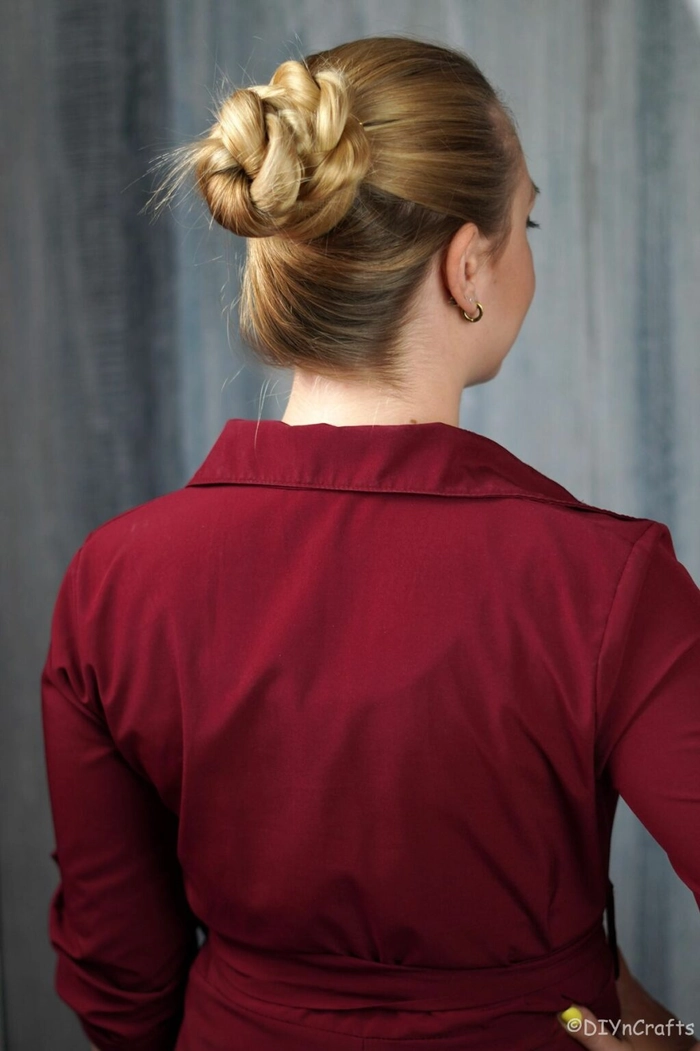 Rope twist bun hairstyle for an elegant corporate dinner event