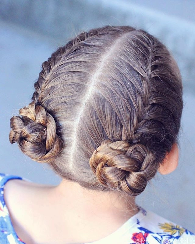 A sophisticated rope twist bun hairstyle suitable for corporate dinner events
