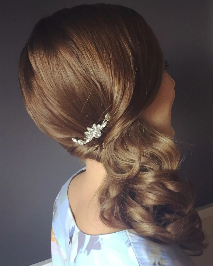 Side swept professional waves hairstyle for evening corporate gala