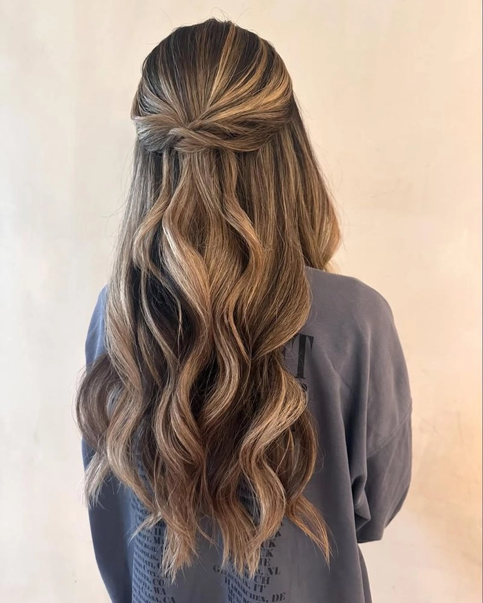 Sleek blowout styling curly hair for a polished office look