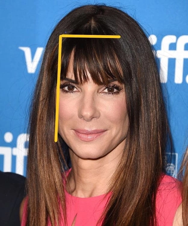 Softening bangs for square faces in corporate settings, side-swept look