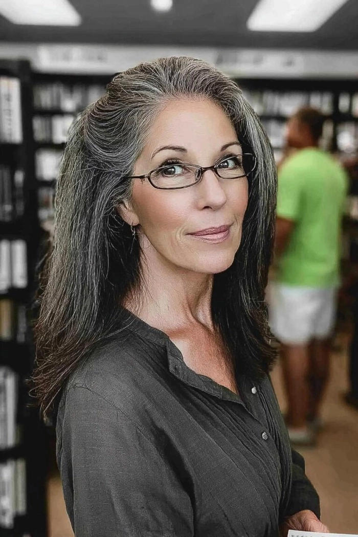 Sophisticated gray hair blending on an older executive in a professional office setting