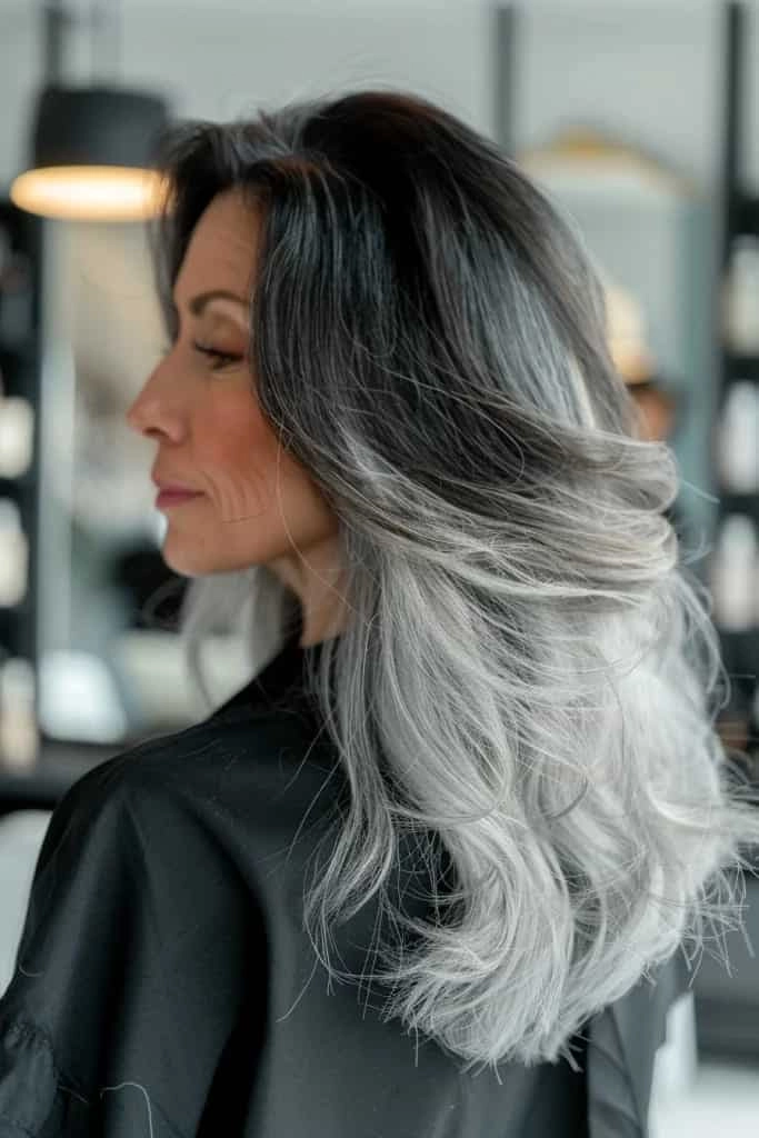 Older male executive with sophisticated gray hair blending and short professional cut