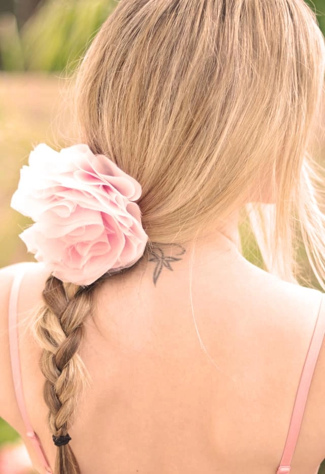 Spring floral hair accessories integrated into a casual office work hairstyle