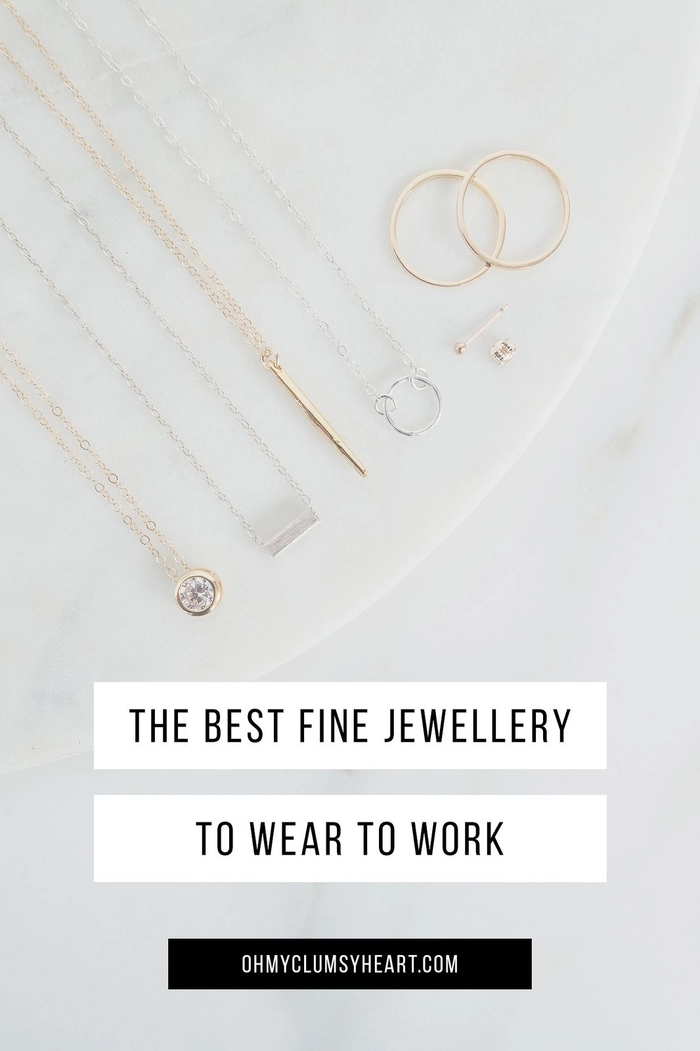 Subtle hair jewelry in a polished low bun for a conservative office look
