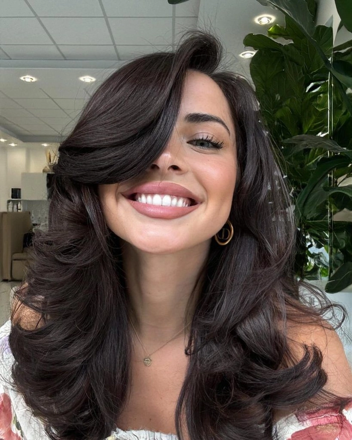 Elegant tamed updo for thick hair in a professional office setting