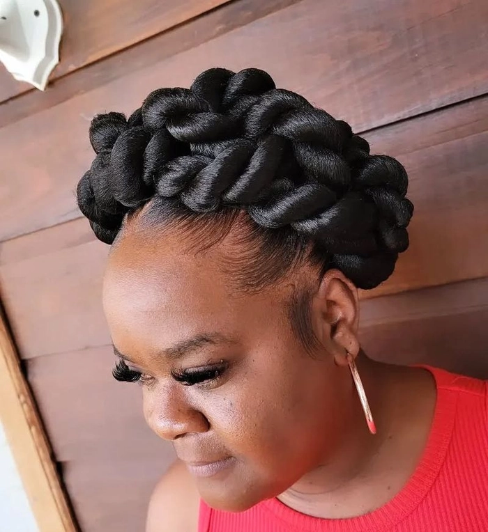 A sleek low bun taming extra thick hair for a professional workspace look