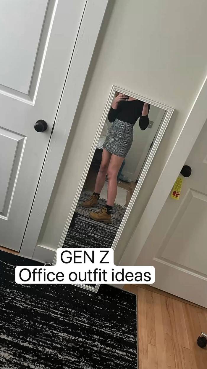 A young Gen Z professional with a trendy office haircut, styled neatly for a corporate workplace