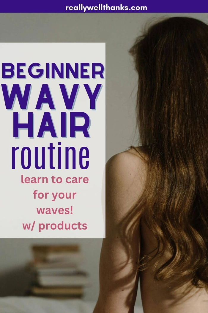 Wavy hair contained in a low bun with pinned sides for desk job focus